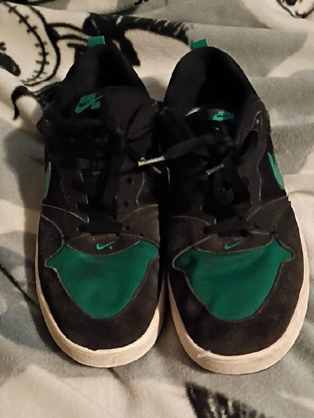 Nike black and teal low-top sneakers